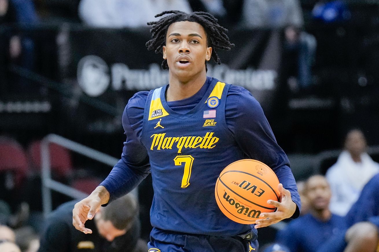 Zaide Lowery #7 of the Marquette Golden Eagles dribbles the ball in the first half of a college basketball game against the Seton Hall Pirates at Prudential Center on January 21, 2025 in Newark, New Jersey.