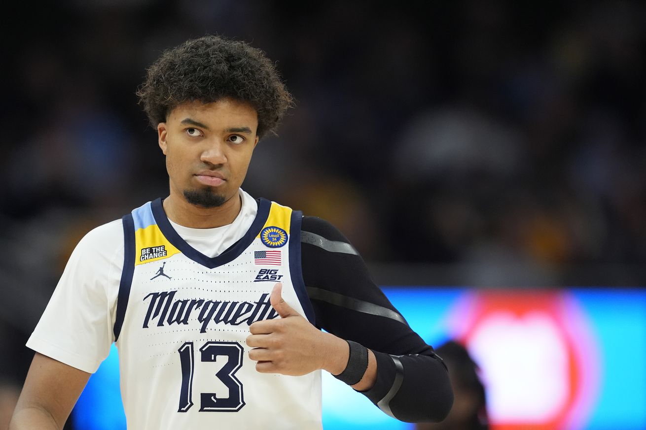 Royce Parham #13 of the Marquette Golden Eagles reacts during the second half against the DePaul Blue Demons at Fiserv Forum on February 11, 2025 in Milwaukee, Wisconsin.