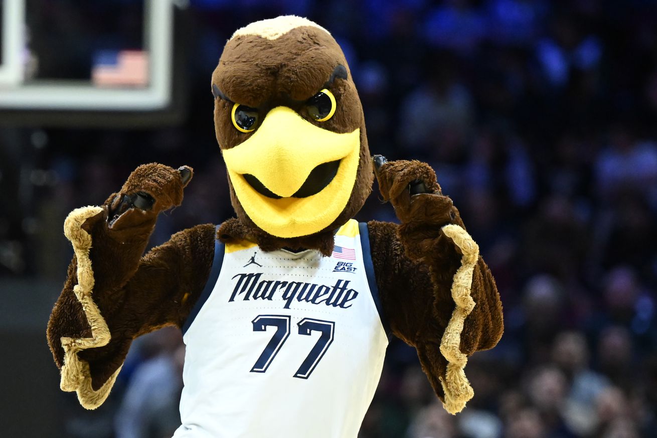 Marquette Golden Eagles mascot, Iggy the Golden Eagle, performs during a timeout in the second half against the New Mexico Lobos in the first round of the NCAA Men’s Basketball Tournament at Rocket Mortgage Fieldhouse on March 21, 2025 in Cleveland, Ohio.