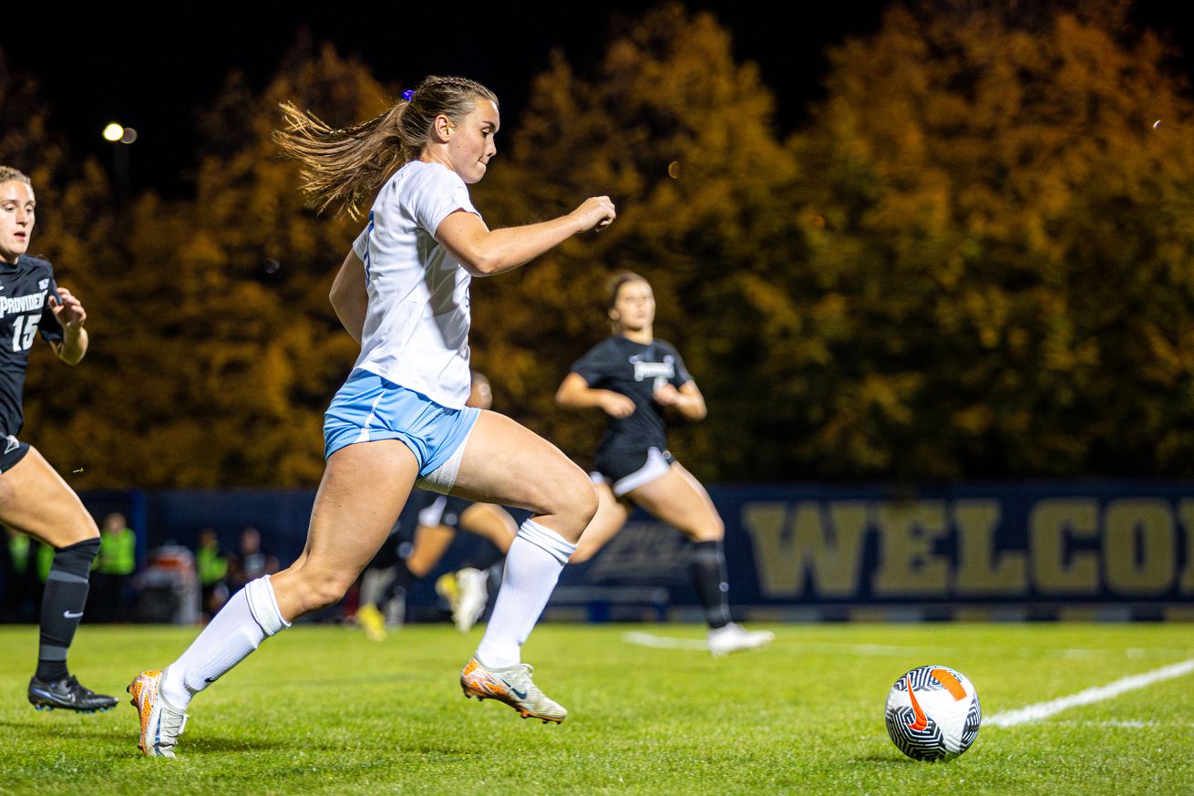 Marquette’s Josie Bieda attacking the ball against Providence at Valley Fields