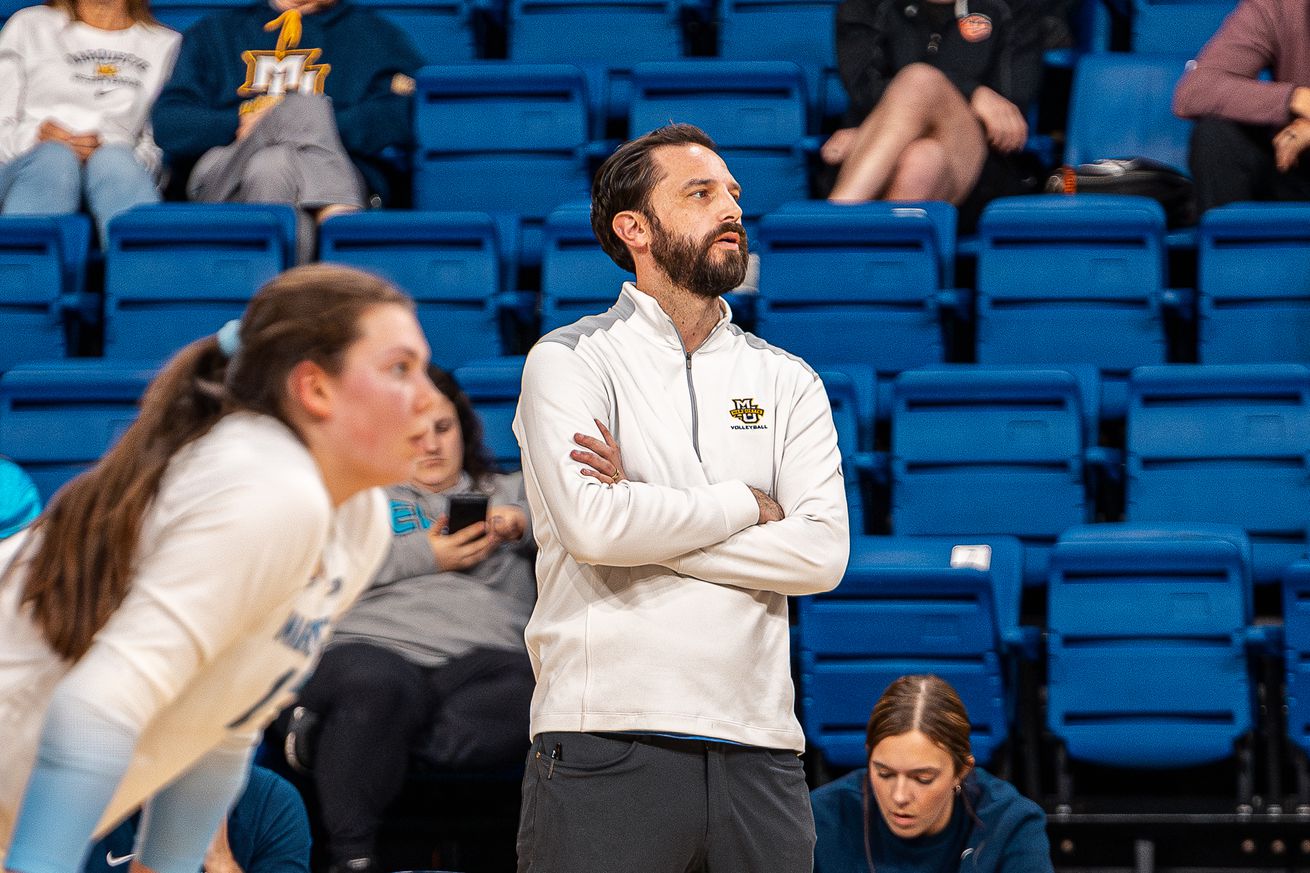 Marquette volleyball head coach Tom Mendoza on the sideline for a spring 2025 exhibition match at the McGuire Center.