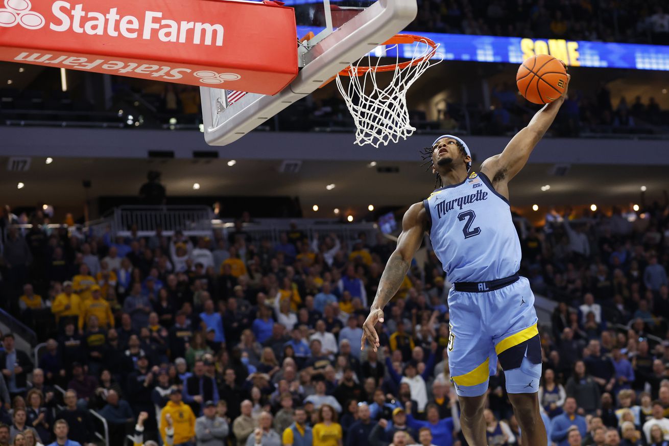 Marquette Golden Eagles guard Chase Ross (2) dunks during a game between the Marquette Golden Eagles and the St. John’s Red Storm at Fiserv Forum on March 8, 2025 in Milwaukee, WI.