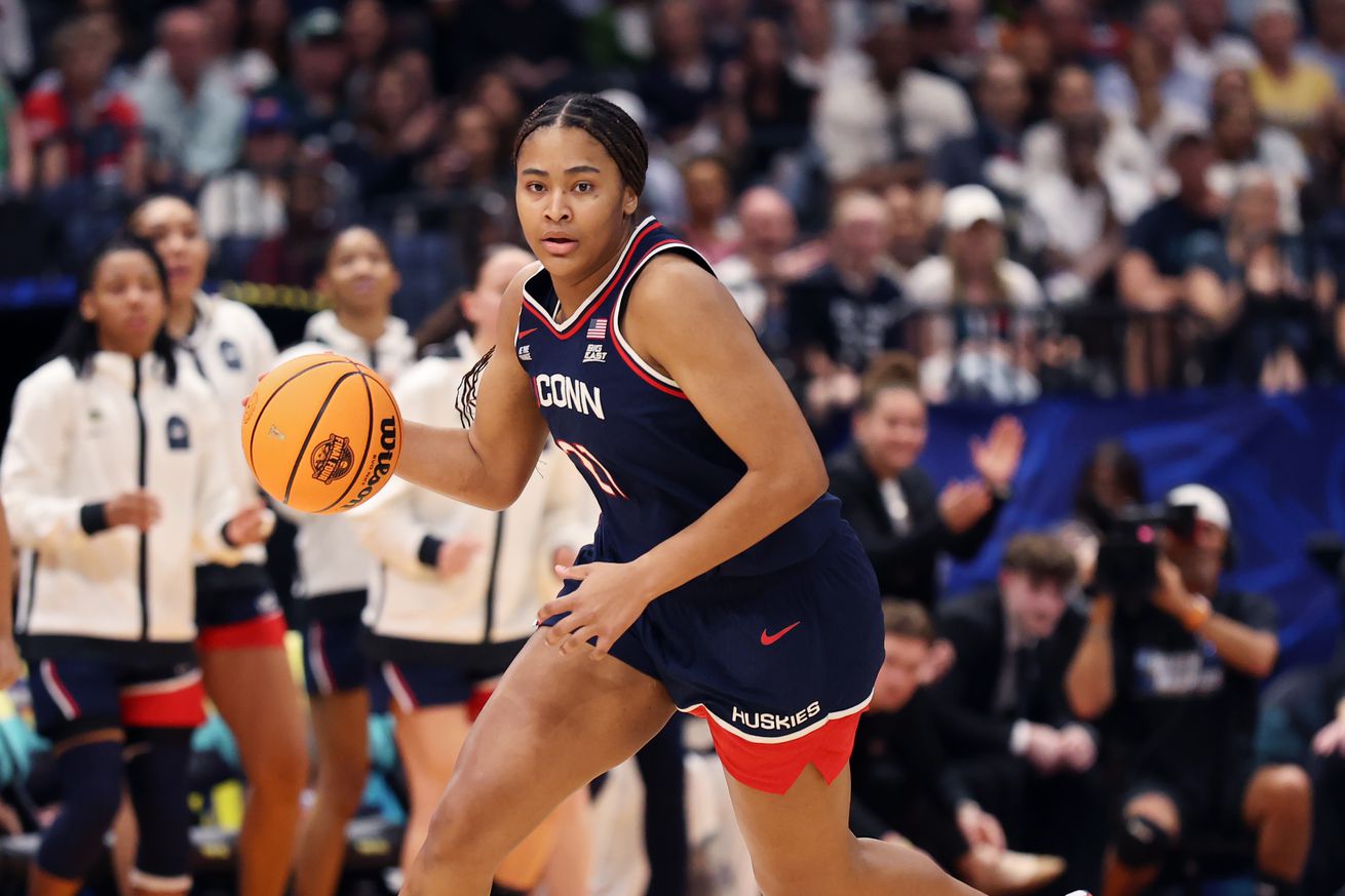 Sarah Strong #21 of the UConn Huskies brings the ball up the court in the first quarter against the UCLA Bruins in the Final Four game of the NCAA Women’s Basketball Tournament at Amalie Arena on April 04, 2025 in Tampa, Florida.