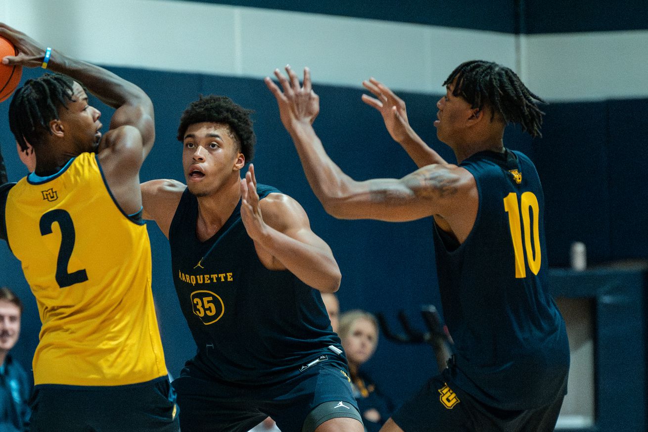 Caedin Hamilton & Damarius Owens defending Chase Ross at a Marquette men’s basketball practice.