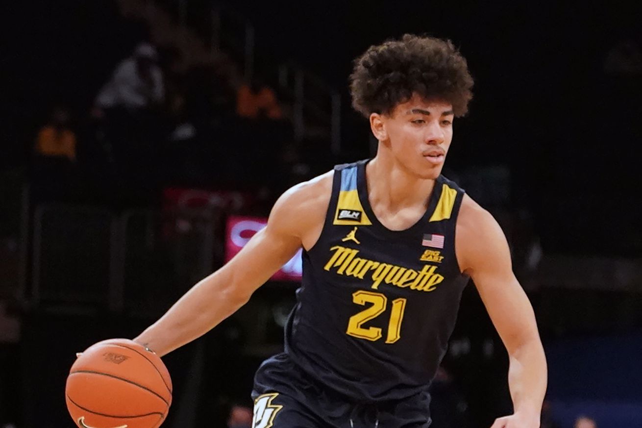 D.J. Carton #21 of the Marquette Golden Eagles dribbles the ball during the first round of the Big East Men’s Basketball Tournament against the Georgetown Hoyas at Madison Square Garden on March 10, 2021 in New York City.
