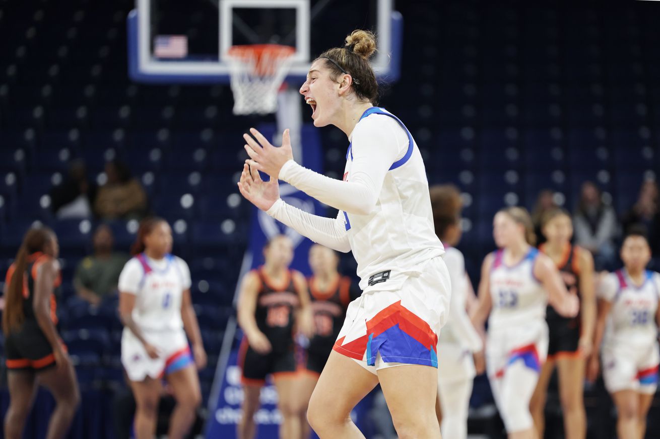 Meg Newman #9 of the DePaul Blue Demons yell in frustration as her team falls behind against the Princeton Tigers at Wintrust Arena on November 9, 2024 in Chicago, Illinois.