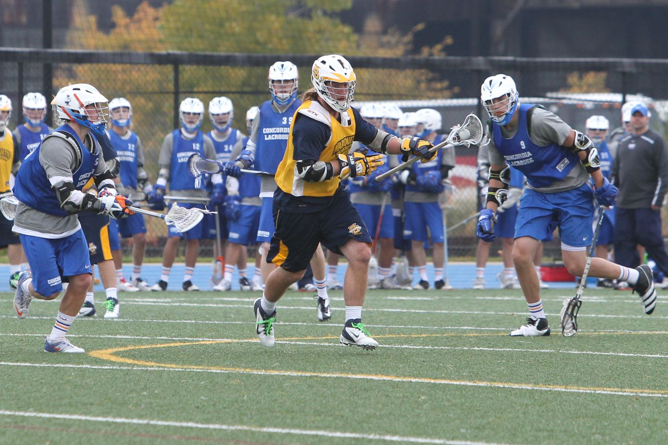 Marquette men’s lacrosse midfielder Andrew Smistad with the ball at Marquette University’s Valley Fields.