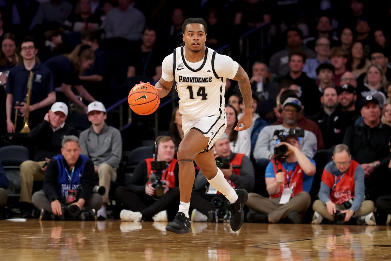 Providence Friars guard Corey Floyd Jr. (14) brings the ball up court against the Butler Bulldogs during the second half at Madison Square Garden.