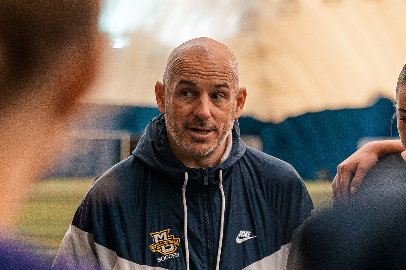 Marquette head women’s soccer coach Chris Allen talking to his team during a spring exhibition match against Wisconsin on April 26, 2025.