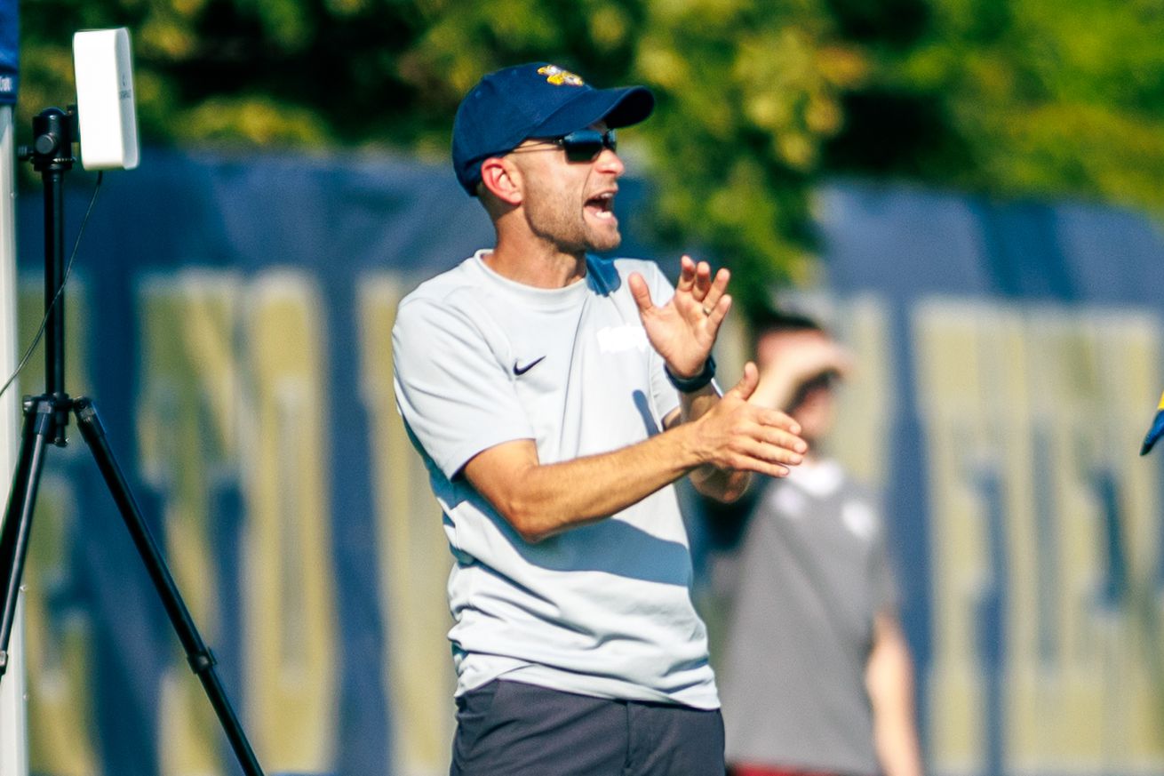 Marquette men’s soccer head coach David Korn on the sideline during a match.