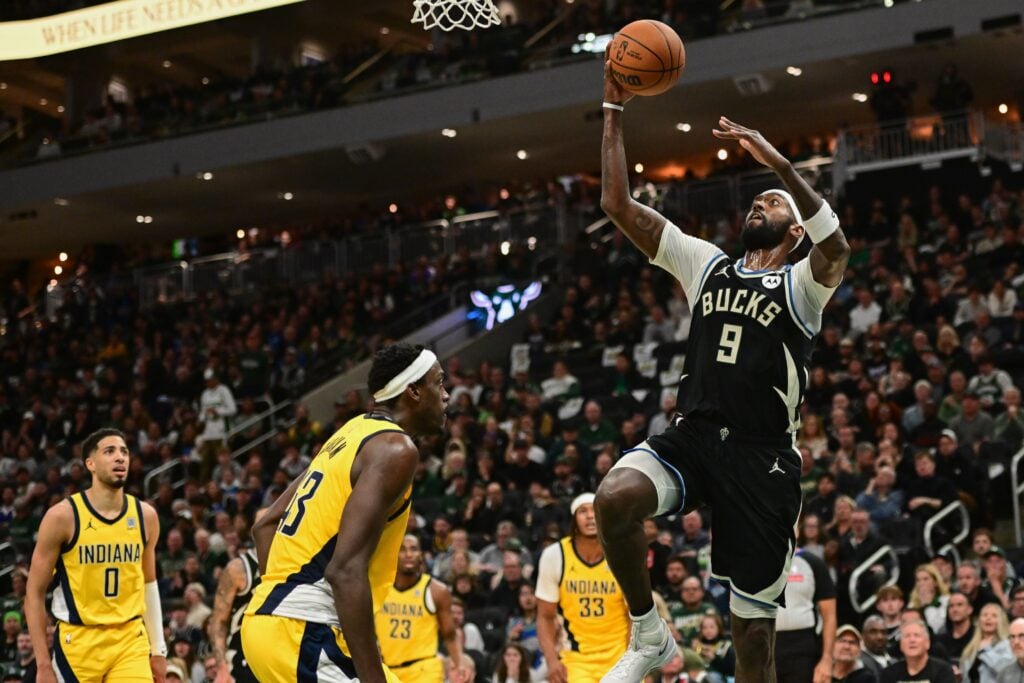 Apr 27, 2025; Milwaukee, Wisconsin, USA; Milwaukee Bucks forward Bobby Portis (9) takes a shot against Indiana Pacers forward Pascal Siakam (43) in the third quarter during game four of first round for the 2024 NBA Playoffs at Fiserv Forum. Mandatory Credit: Benny Sieu-Imagn Images