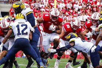 Now NFL player, then running back Braelon Allen powers through Michigan defenders. October 3, 2021. 